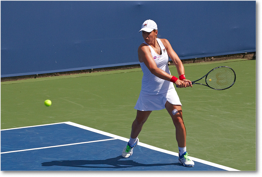 Erakovic (l Kvitova R32) Cincy2013_D4C5017 copy